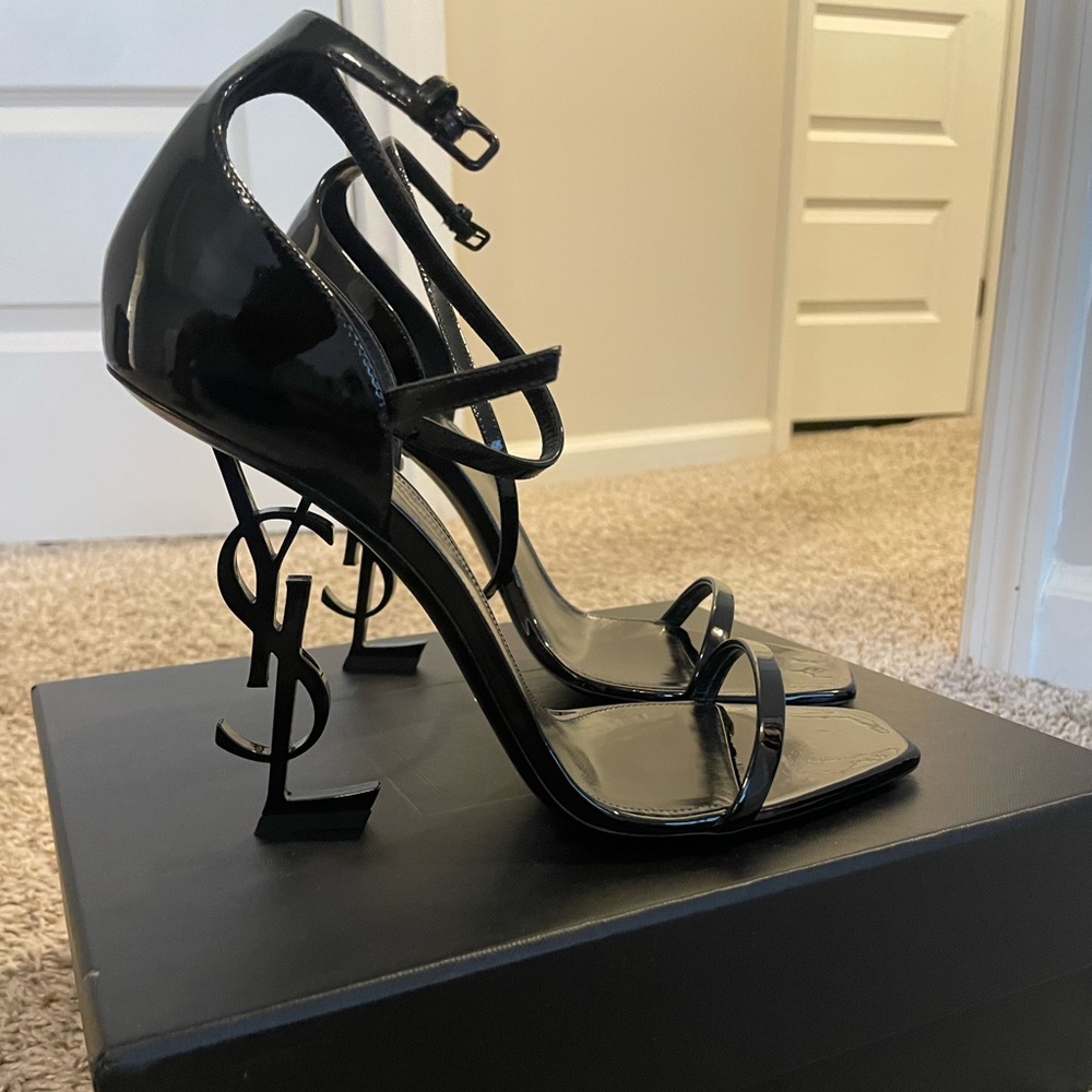 Worn Twice- less than an hour each time. Comes with original box, dust bag